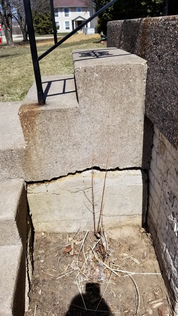 porch steps pulling away from a porch