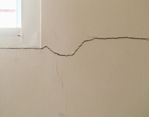 A crack radiating from a window frame